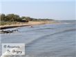 Песчанный берег по Косе Чушке около п. Ильич